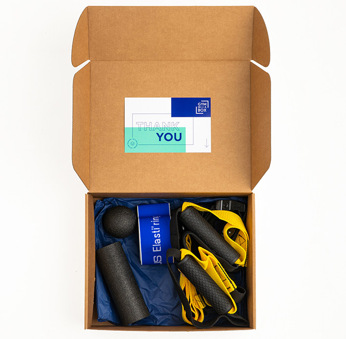 Gym equipment box champion containing fitness tools like foam rollers, straps, and resistance bands a  Pelion-villas.com service.